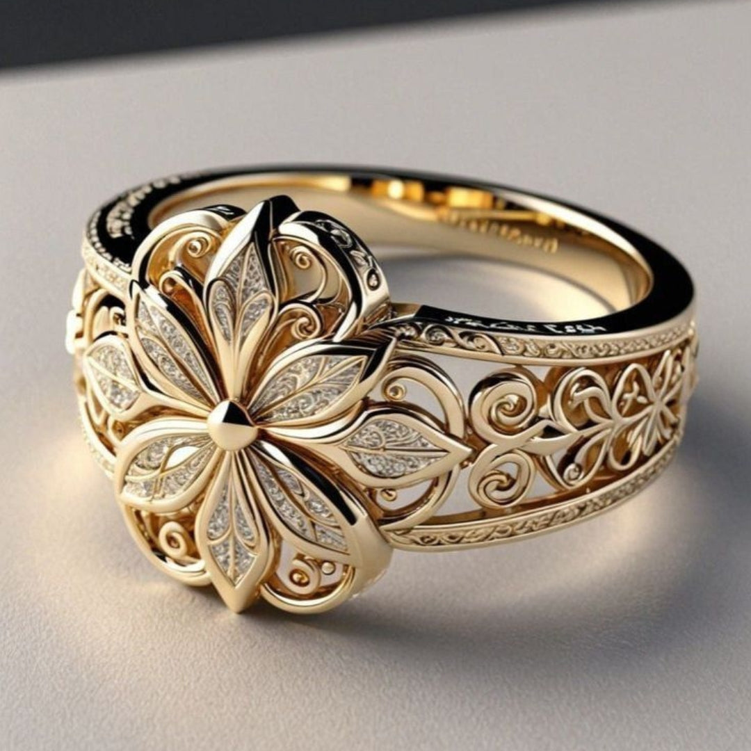 Ring – guldfarvet med zirkoner blomsterformede