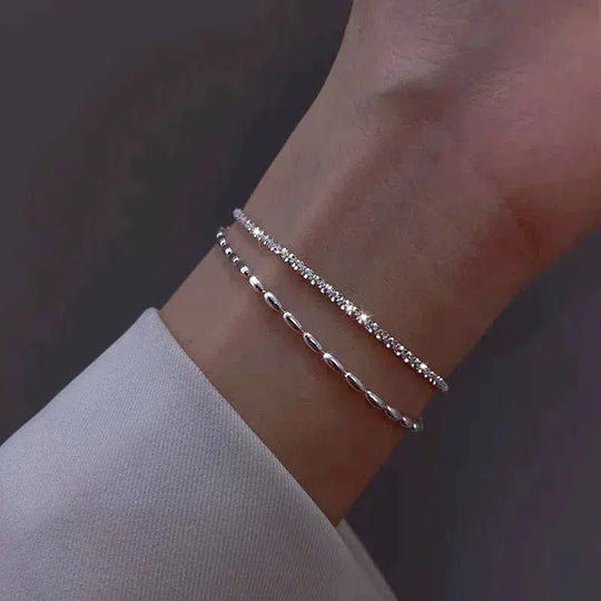 Elegant sølvarmbåndssæt med zirkoniasten