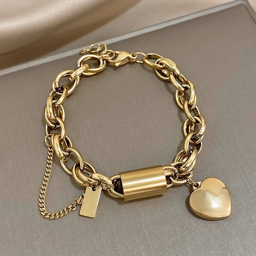 Armbånd – kraftigt en hjerte i guld
