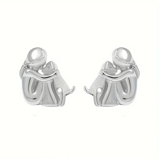 Zweifarbige Huggie-Ohrringe in Silber und Gold