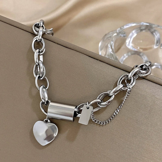 Armbånd – kraftigt en hjerte i guld