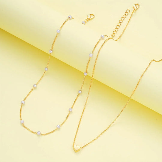 Elegant minimalistisk halskæde- og armbåndssæt