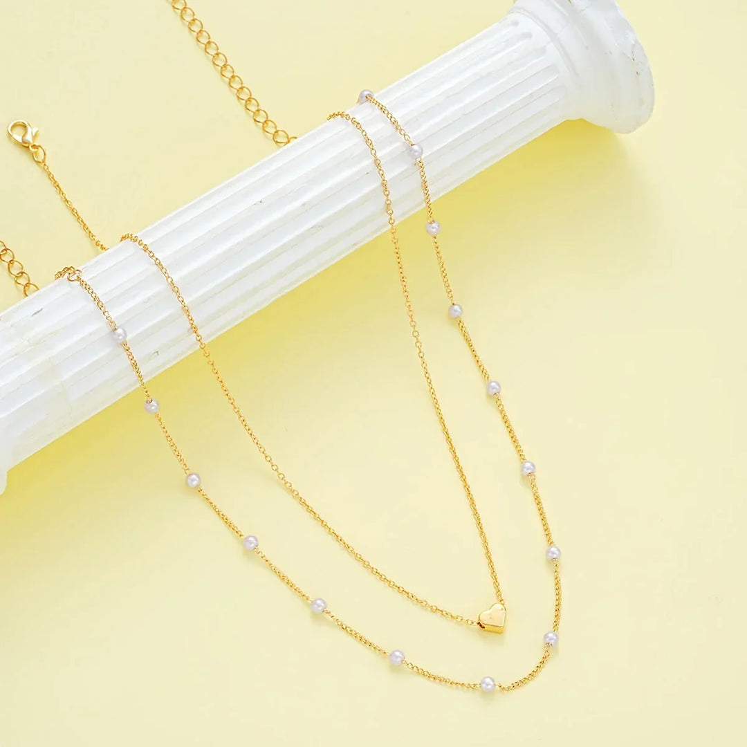 Elegant minimalistisk halskæde- og armbåndssæt