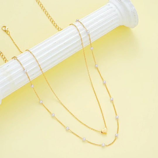 Elegant minimalistisk halskæde- og armbåndssæt